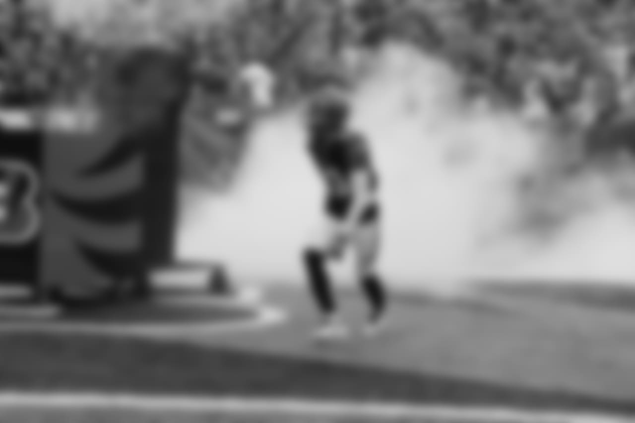 Tyler Boyd runs out onto the field as the Bengals host the Browns in week 12.
