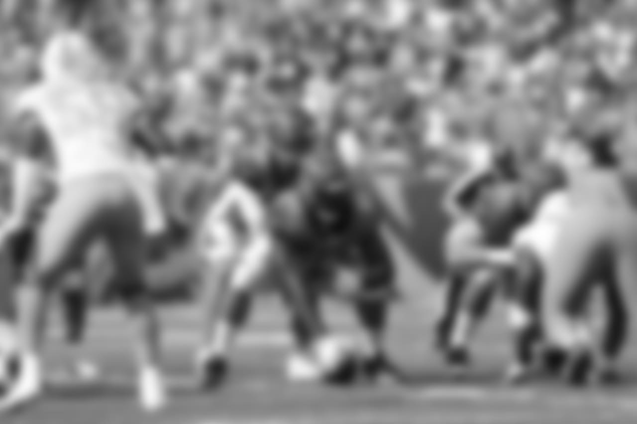 Center Trey Hopkins prepares to snap the ball before the week 5 game against the Miami Dolphins.