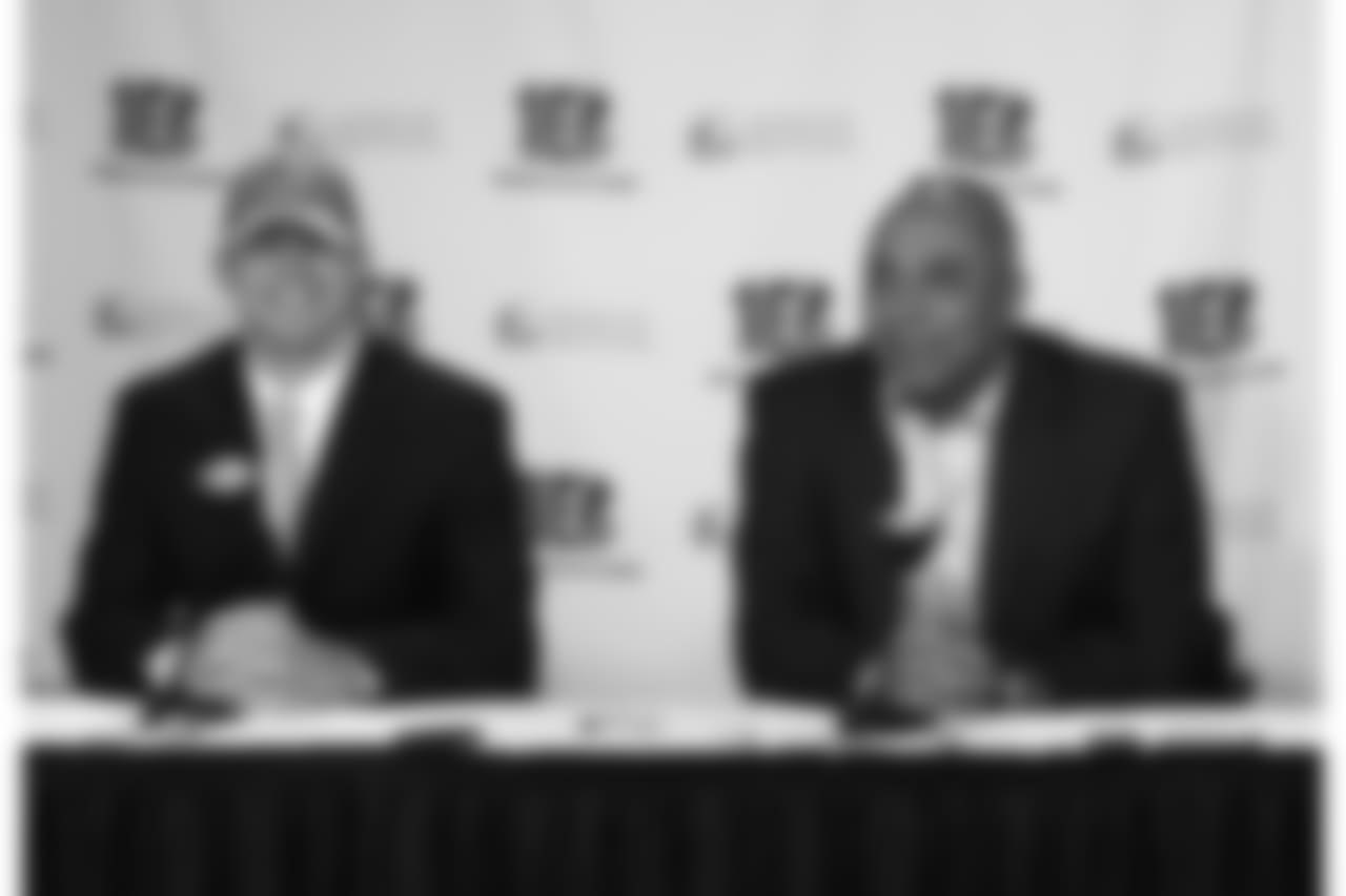 Cincinnati Bengals NFL second round draft pick Andy Dalton, left, a quarterback from TCU, sits with head coach Marvin Lewis, right, during a news conference, Saturday, April 30, 2011, in Cincinnati. (AP Photo/David Kohl)