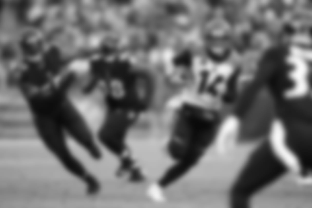 Cincinnati Bengals quarterback Andy Dalton (14) rushes the ball in the second half of an NFL football game against the Baltimore Ravens, Sunday, Nov. 18, 2018, in Baltimore. (AP Photo/Nick Wass)