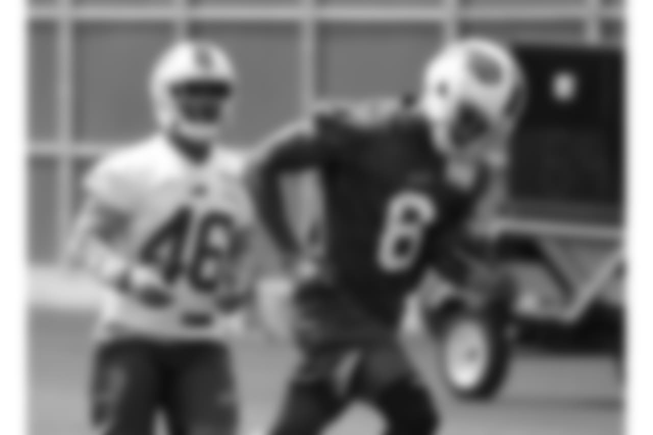 Ryan Carter, CB, #46 and Robert Foster, WR, #8