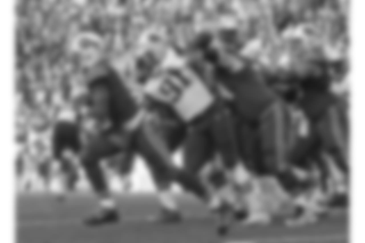 Tyrod Taylor #5, QB; Richie Incognito #64, G; and Eric Wood #70, C