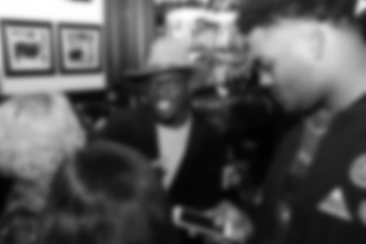 Dymonte Thomas shares a laugh during Shane Ray's 2nd Annual Rays Awareness Steak Dinner at 801 Chophouse in Denver on November 12, 2018.