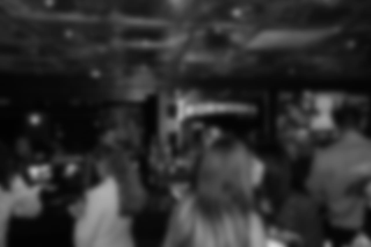 Guests mingle at the bar during Von's Vision at Mile High Station in Denver on November 5, 2018.