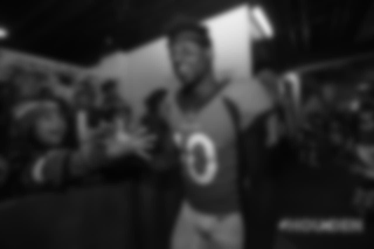 Emmanuel Sanders high-fives fans in the tunnel during player introductions before the Broncos' Week 9 game against the Houston Texans at Broncos Stadium at Mile High on November 4, 2018.