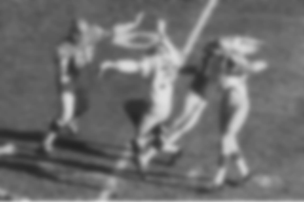 Bill Keating sacks a Chargers QB.