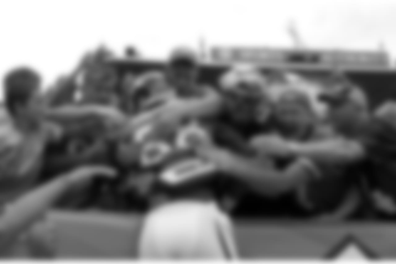 Demaryius Thomas jumps into the stands after scoring a touchdown against the Philadelphia Eagles on Sept. 29, 2013.