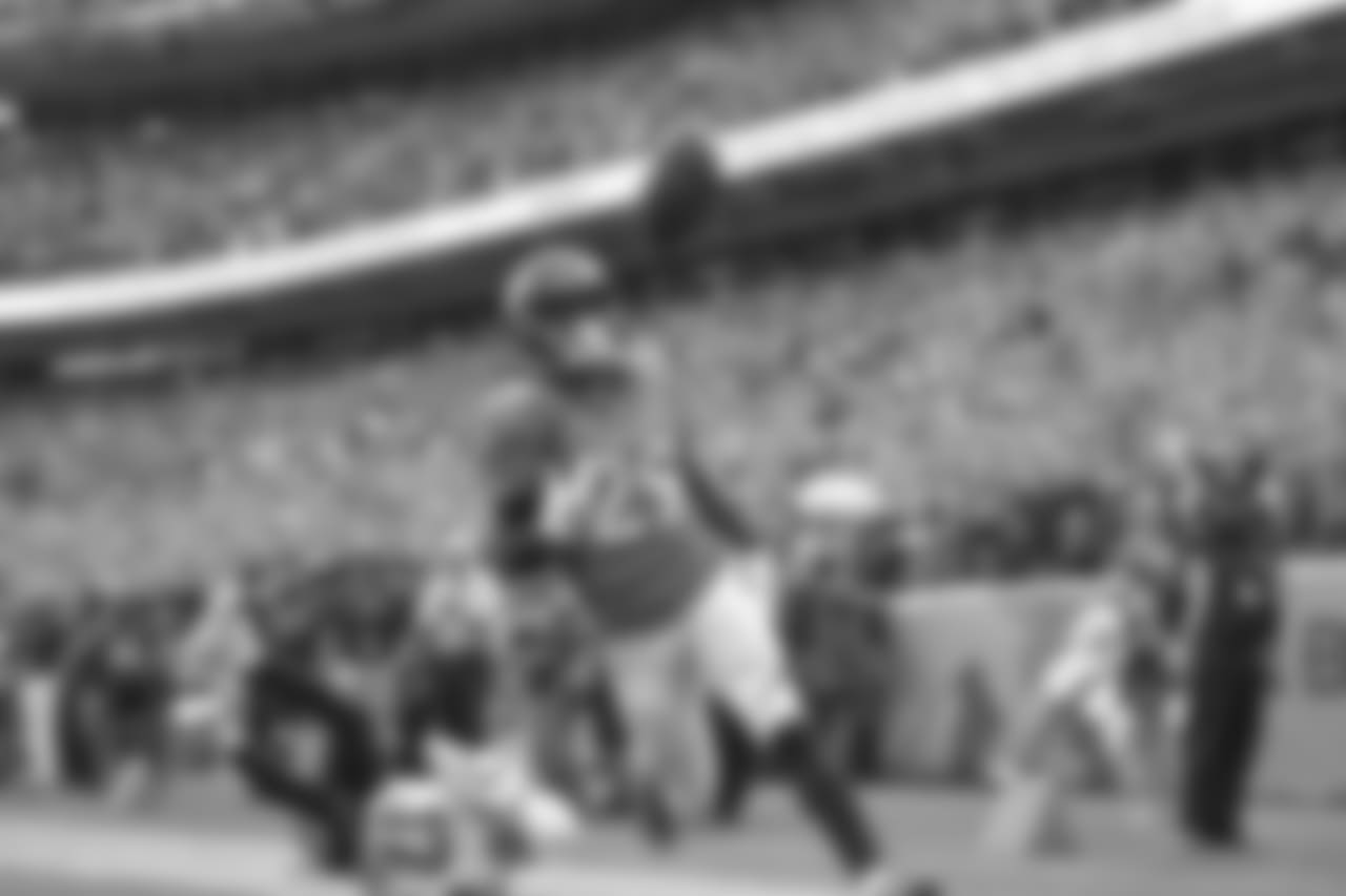 Denver Broncos cornerback Bradley Roby (29) intercepts a San Diego Chargers quarterback Philip Rivers (17) pass and returns it 49-yards for a touchdown during second quarter action in the NFL game at Sports Authority Field in Denver, Colo. October 30, 2016.