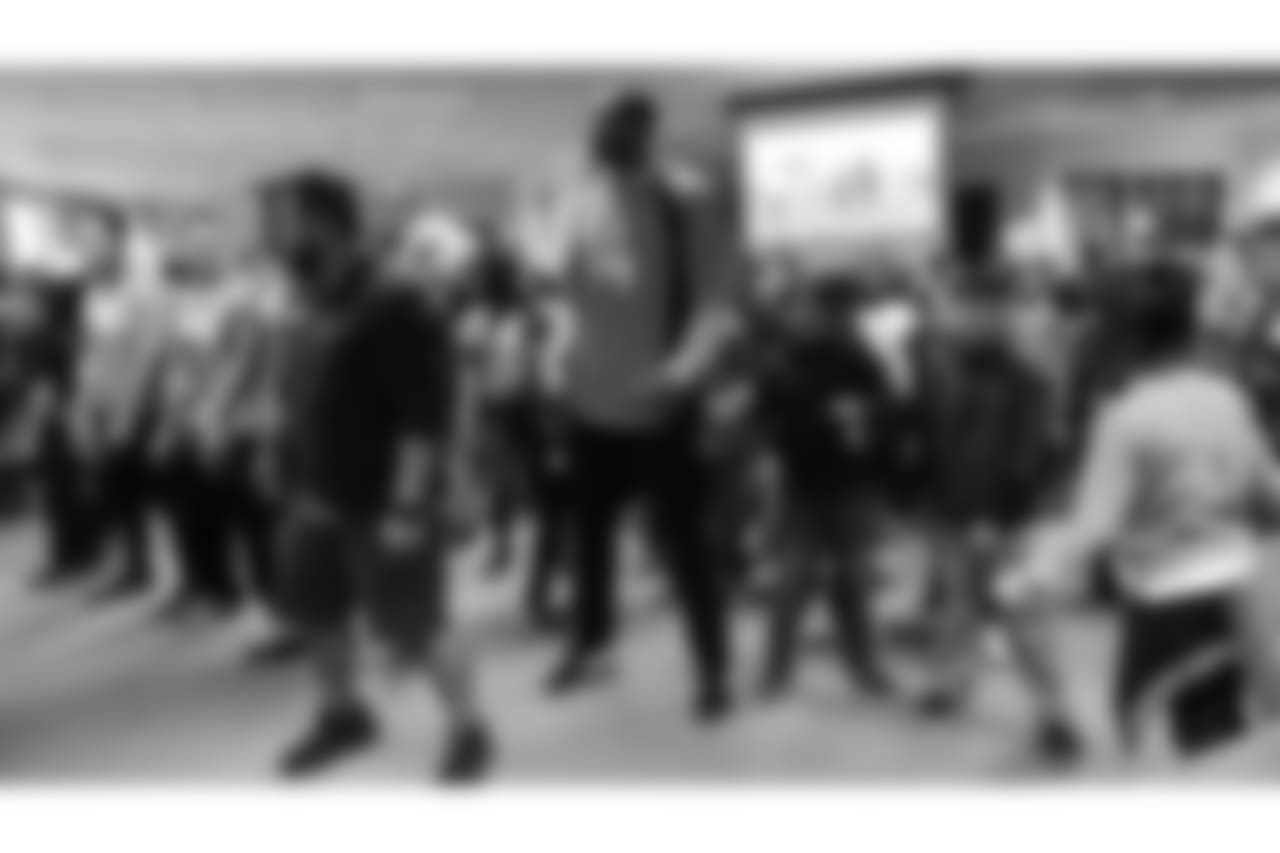 Courtland Sutton dances at a Playworks recess visit (alongside CarMax volunteers) with first-, second- and third-grade students at Greenwood Academy on October 9, 2018.