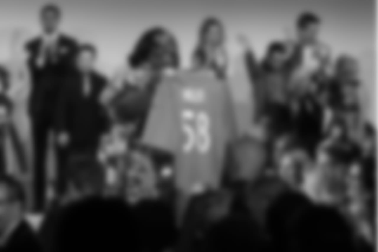 DeOndra Dixon shows off her autographed Von Miller jersey at the Global Down Syndrome Foundation's Be Beautiful Be Yourself Fashion Show at the Sheraton Denver Downtown on October 20, 2018.