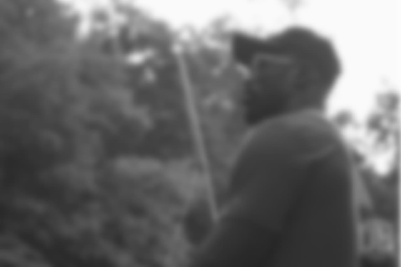 Von Miller tries his hand at fly fishing at the fishing portion of Von Miller's Pass Rush Summit at Dogwood Canyon Nature Park on June 28, 2018.