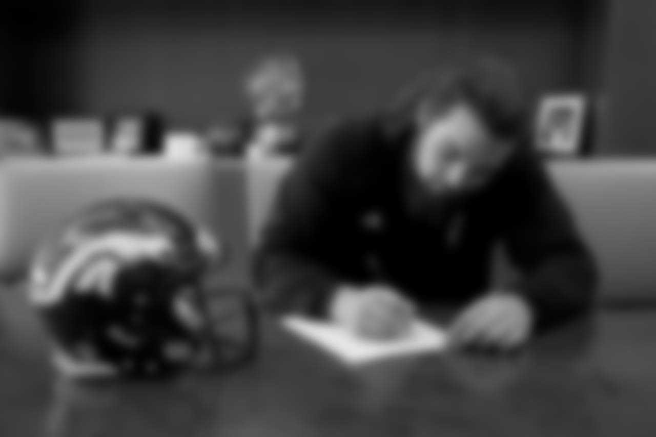G Sam Jones signs his rookie contract.