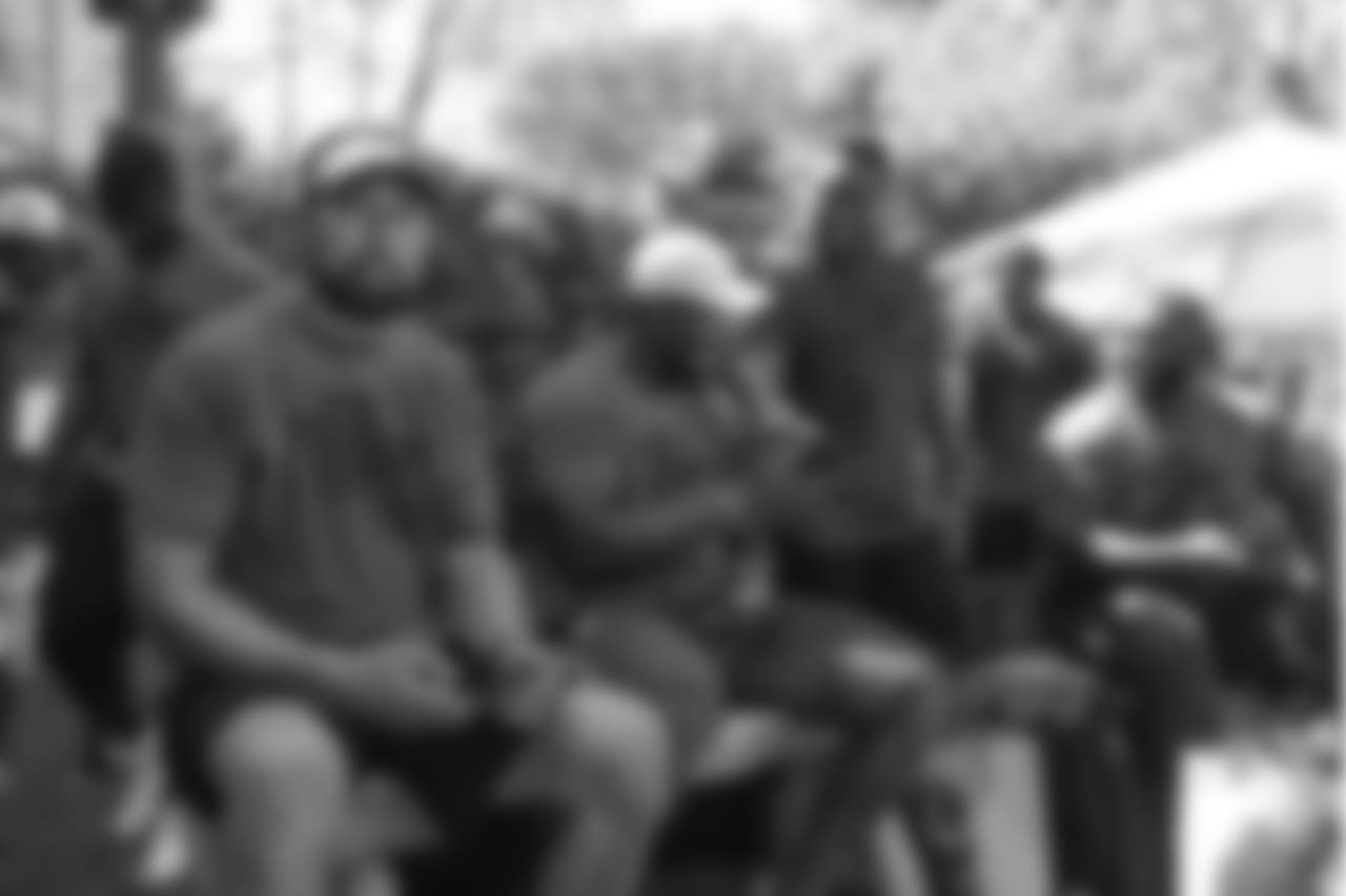 At the on-field portion of Von Miller's Pass Rush Summit, which included hands-on instruction and drills, on June 28, 2018. Pass rush coach Chuck Smith, Von Miller, Warren Sapp and D.J. Reader are pictured, from left to right.