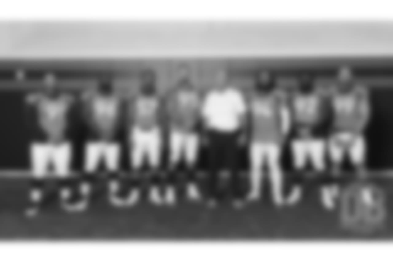 Niles Scott, Shelby Harris, DeMarcus Walker, Derek Wolfe, Defensive Line Coach Bill Kollar, Domata Peko Sr., Zach Kerr and Adam Gotsis at team photo day at UCHealth Training Center on September 15, 2018.