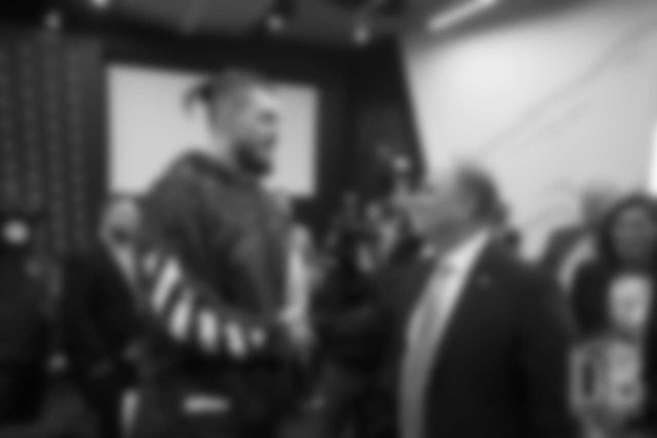 Derek Wolfe greets Head Coach Vic Fangio after his introductory press conference on January 10, 2019.
Photo by Gabriel Christus