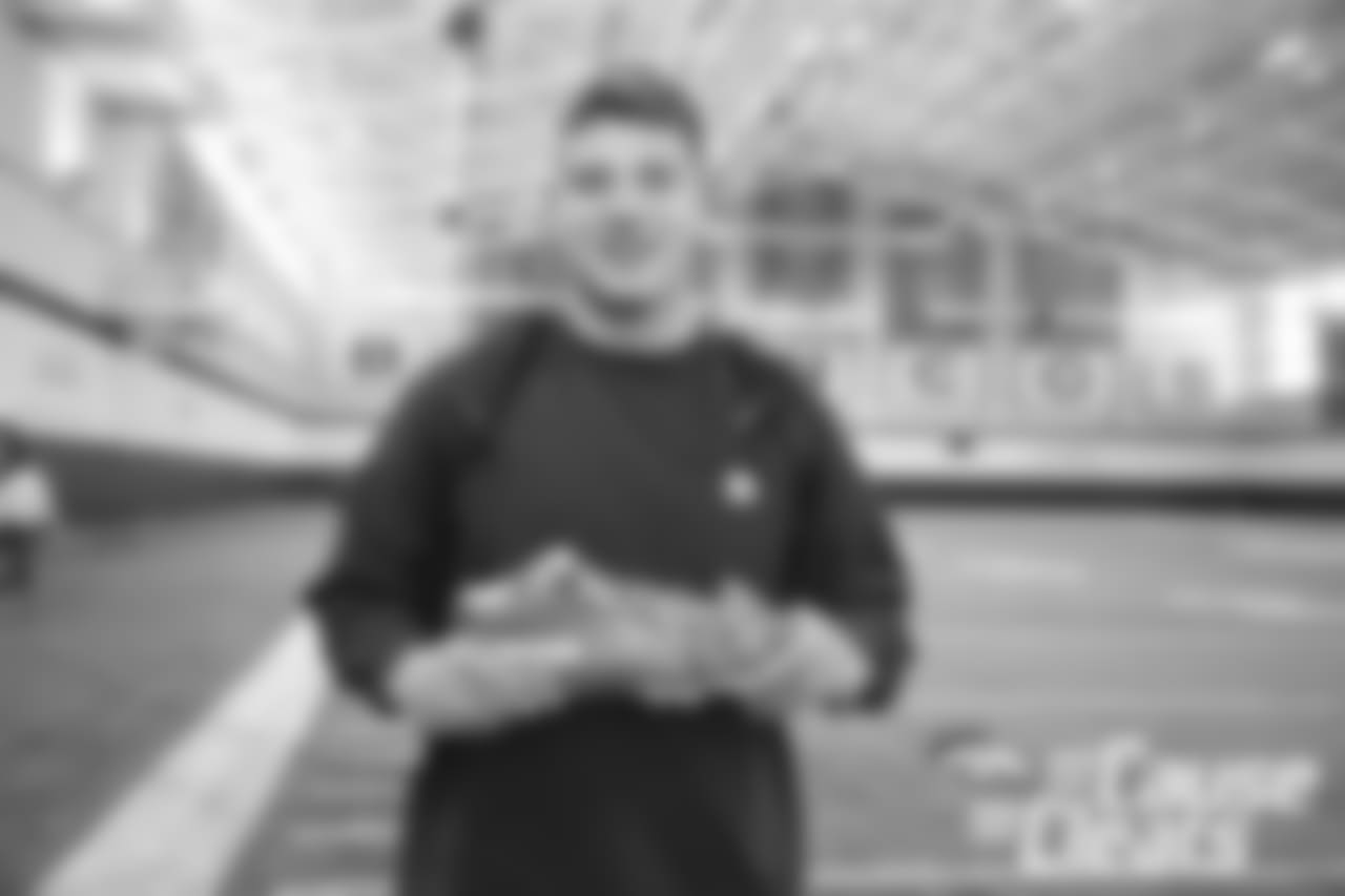 Troy Fumagalli shows off his custom cleats during the 2018 My Cause My Cleats unveiling for the players.