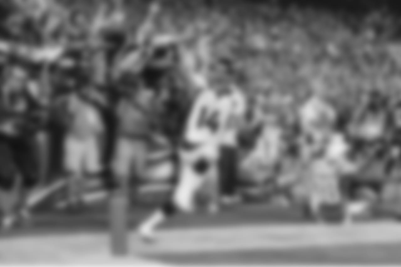 Brandon Stokley (14) celebrates his 21-yard touchdown reception to give Denver a 28-24 lead with 9:03 remaining in the fourth quarter. The Broncos had fallen behind 24-0 in the first half before rallying for the comeback victory.