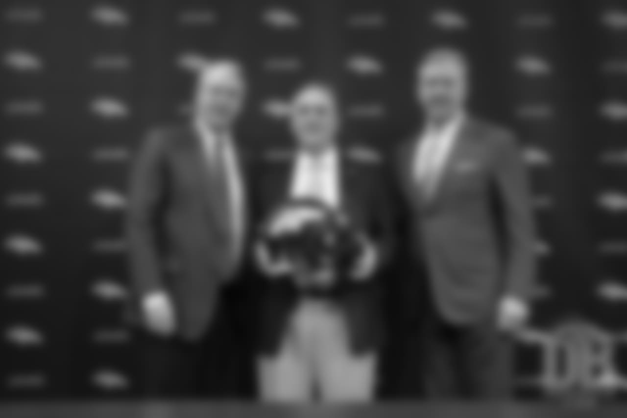 President and CEO Joe Ellis, Head Coach Vic Fangio and President of Football Operations/General Manager John Elway pose for a photo after Fangio's introductory press conference.
Photo by Gabriel Christus
