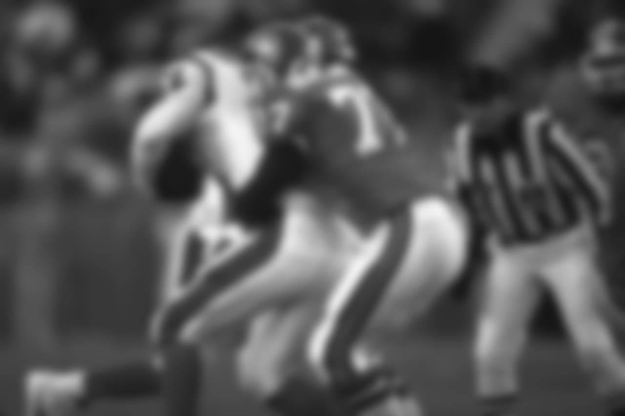 Linebacker Karl Mecklenburg wraps up a Bengals ballcarrier during a November 27, 1994 win (15-13) over Cincinnati at Mile High Stadium.