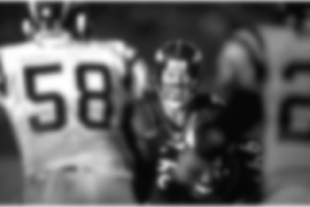 John Elway shouts the snap count during the last regular season home game of the year against the San Diego Chargers at Mile HIgh Stadium December 21, 1997.