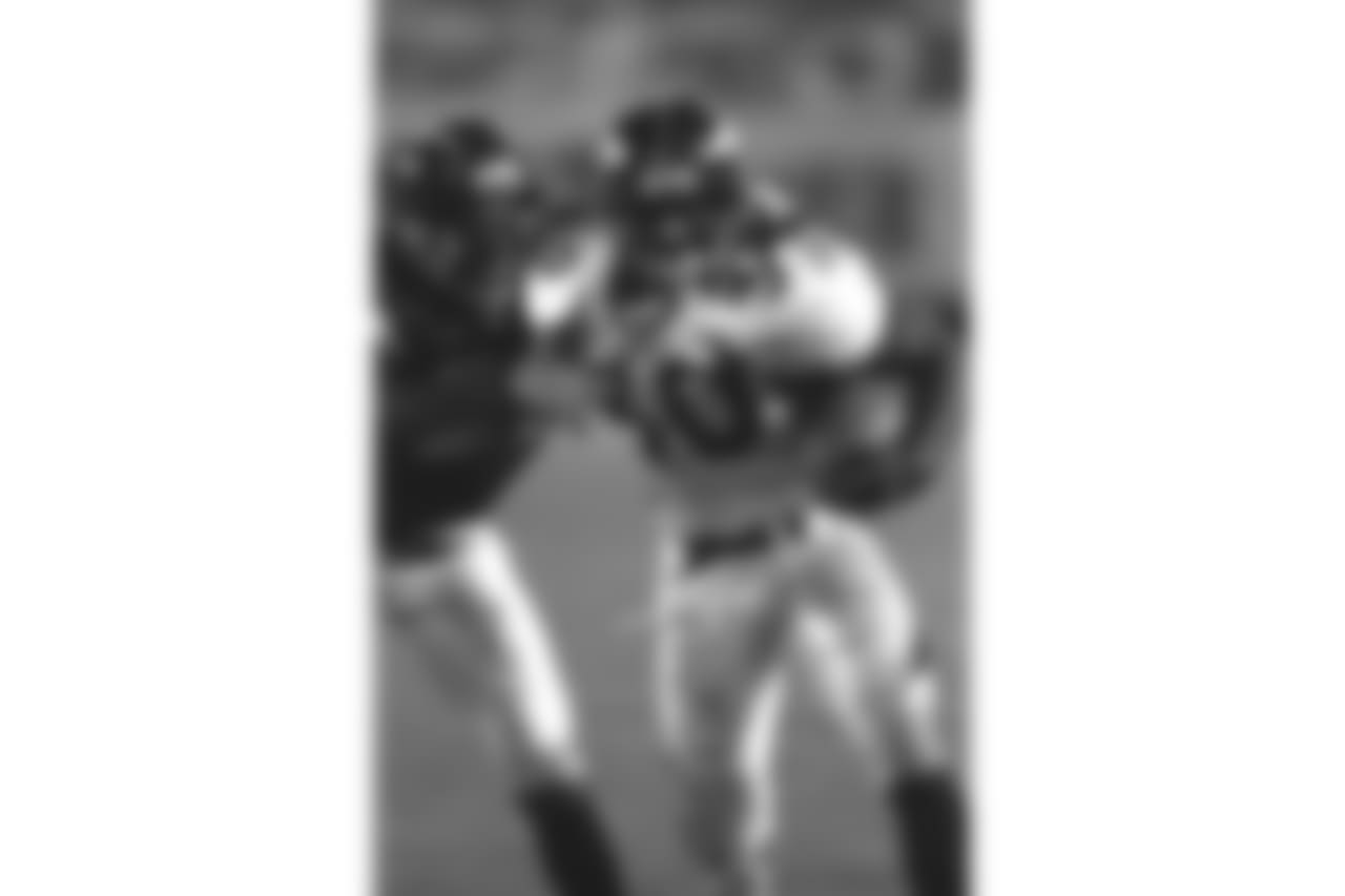 Denver Broncos in action against the San Diego Chargers at Jack Murphy Stadium in San Diego, CA on November 30, 1997.