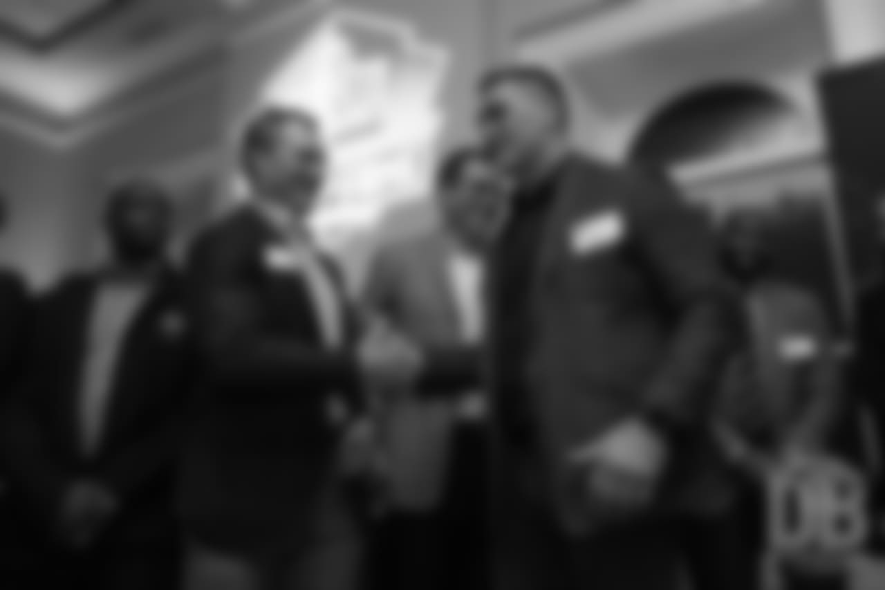 John Lynch greets Kevin Mawae during a presentation of the Hall of Fame finalists at the Pro Football Hall of Fame's Celebration of Excellence Reception in Atlanta on January 31, 2019.