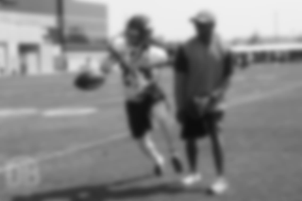 Cornerback Bradley Roby (29) and Defensive Backs Coach Greg Williams during a practice at UCHealth Training Center on Aug. 13, 2018.