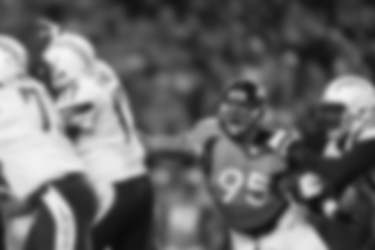 Derek Wolfe (95) pressures San Diego Chargers quarterback Philip Rivers (17) on Jan. 3, 2016.
Photo by Gabriel Christus