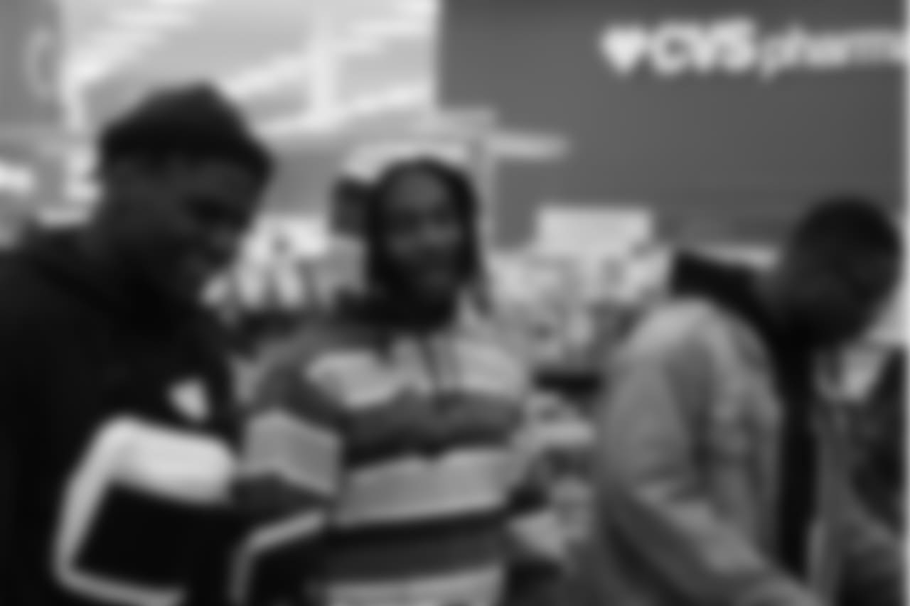 Jeff Holland, Bradley Roby and Will Parks during Will Parks' shopping spree for the Boys & Girls Club of Metro Denver on Dec. 3, 2018