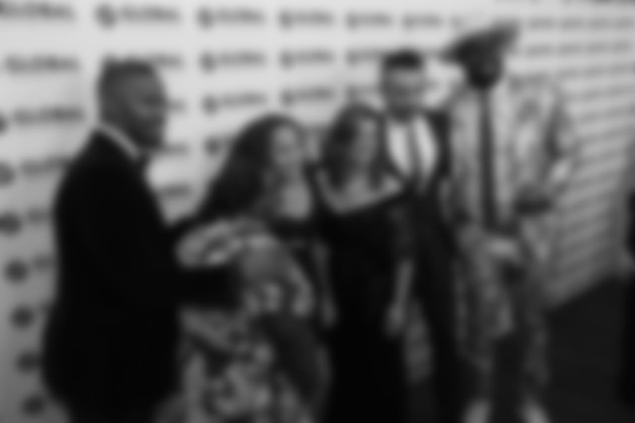 Actors Jamie Foxx (far left) and Colin Farrell (second from right) and Von Miller at the Global Down Syndrome Foundation's Be Beautiful Be Yourself Fashion Show at the Sheraton Denver Downtown on October 20, 2018.