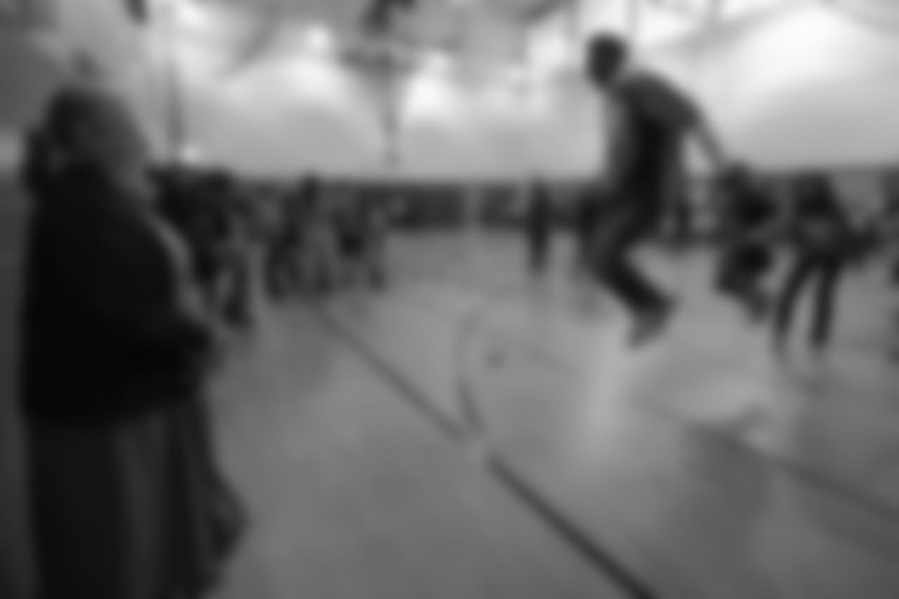 Demaryius Thomas jumps rope at a Playworks recess visit (alongside CarMax volunteers) with first-, second- and third-grade students at Greenwood Academy on October 9, 2018.