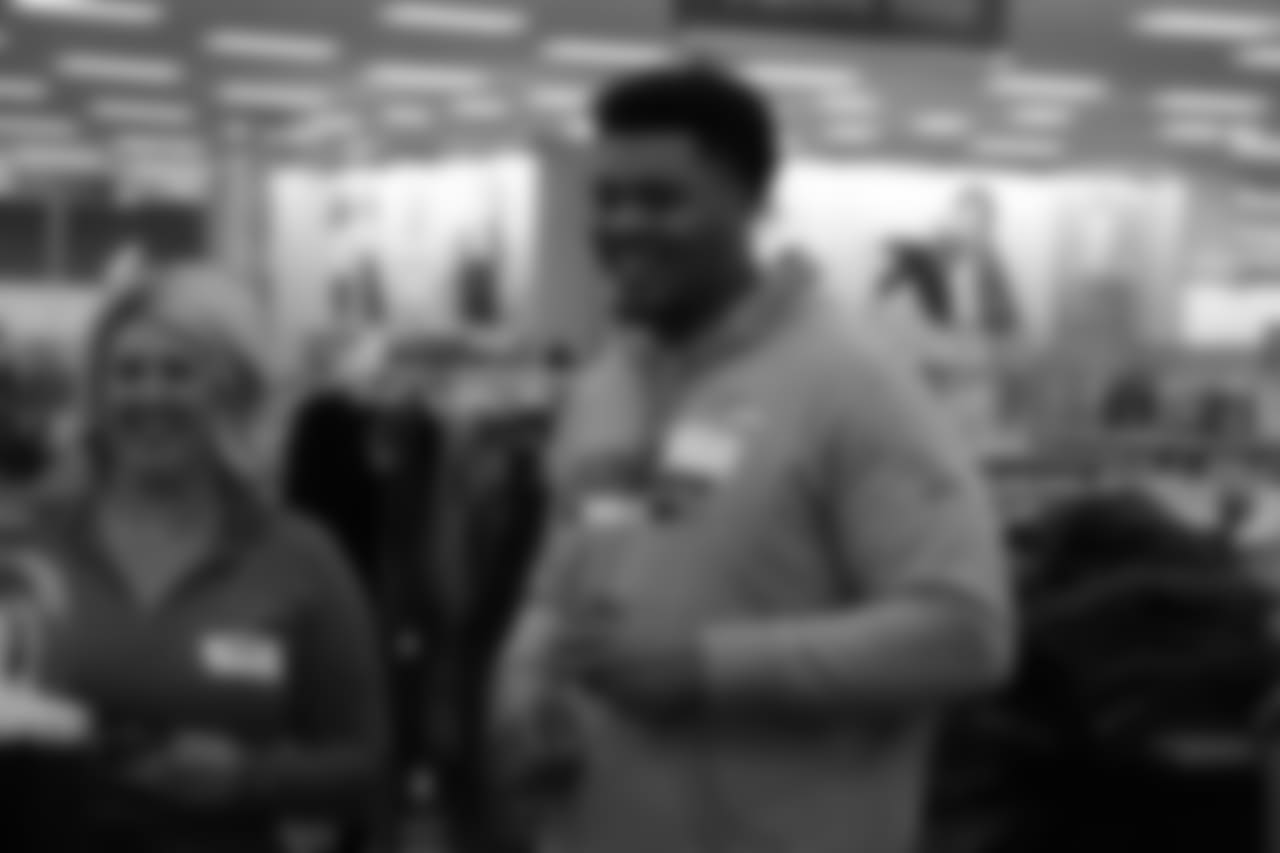 Elijah Wilkinson shares a laugh during Will Parks' shopping spree for the Boys & Girls Club of Metro Denver on Dec. 3, 2018