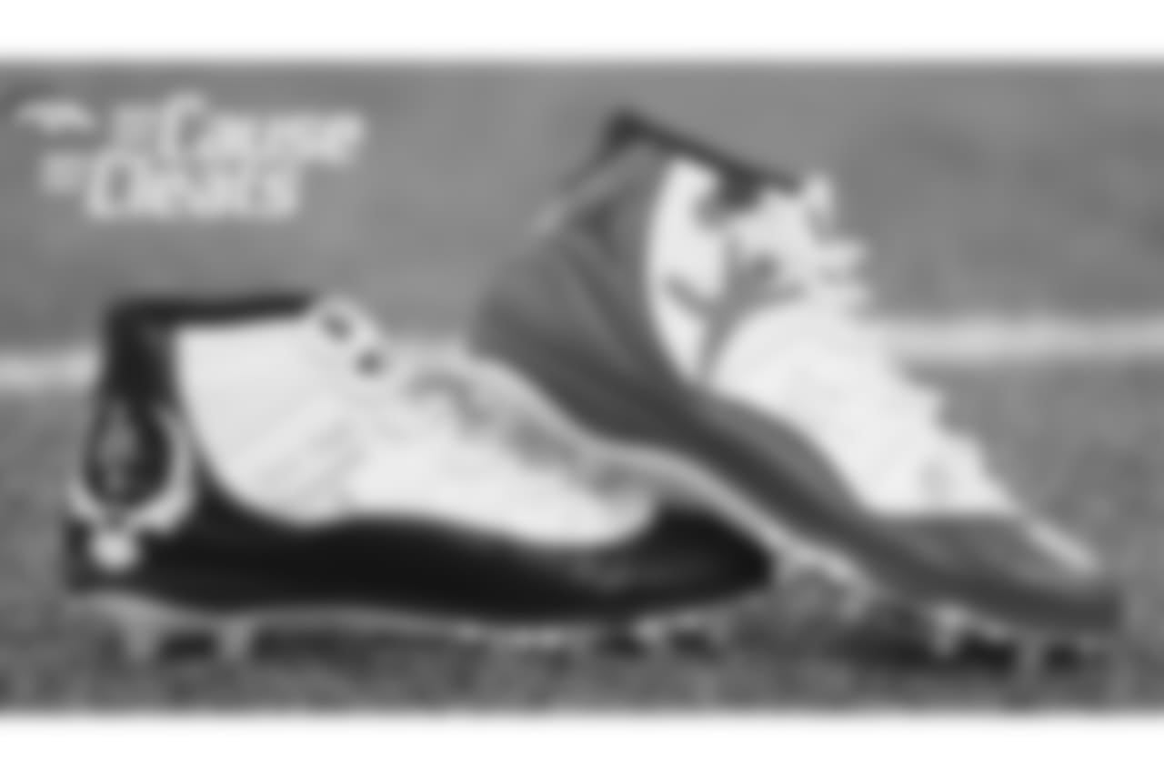 DeMarcus Walker's cleats represent Children's Hospital Colorado and were designed by children from the hospital for My Cause My Cleats in 2018.