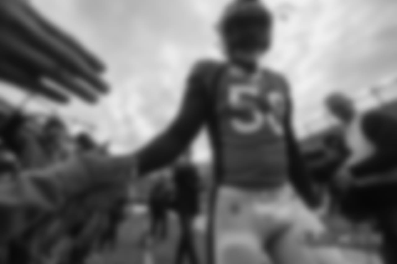 Von Miller high-fives fans before the Broncos' Week 17 game against the Los Angeles Chargers at Broncos Stadium at Mile High on December 30, 2018.
