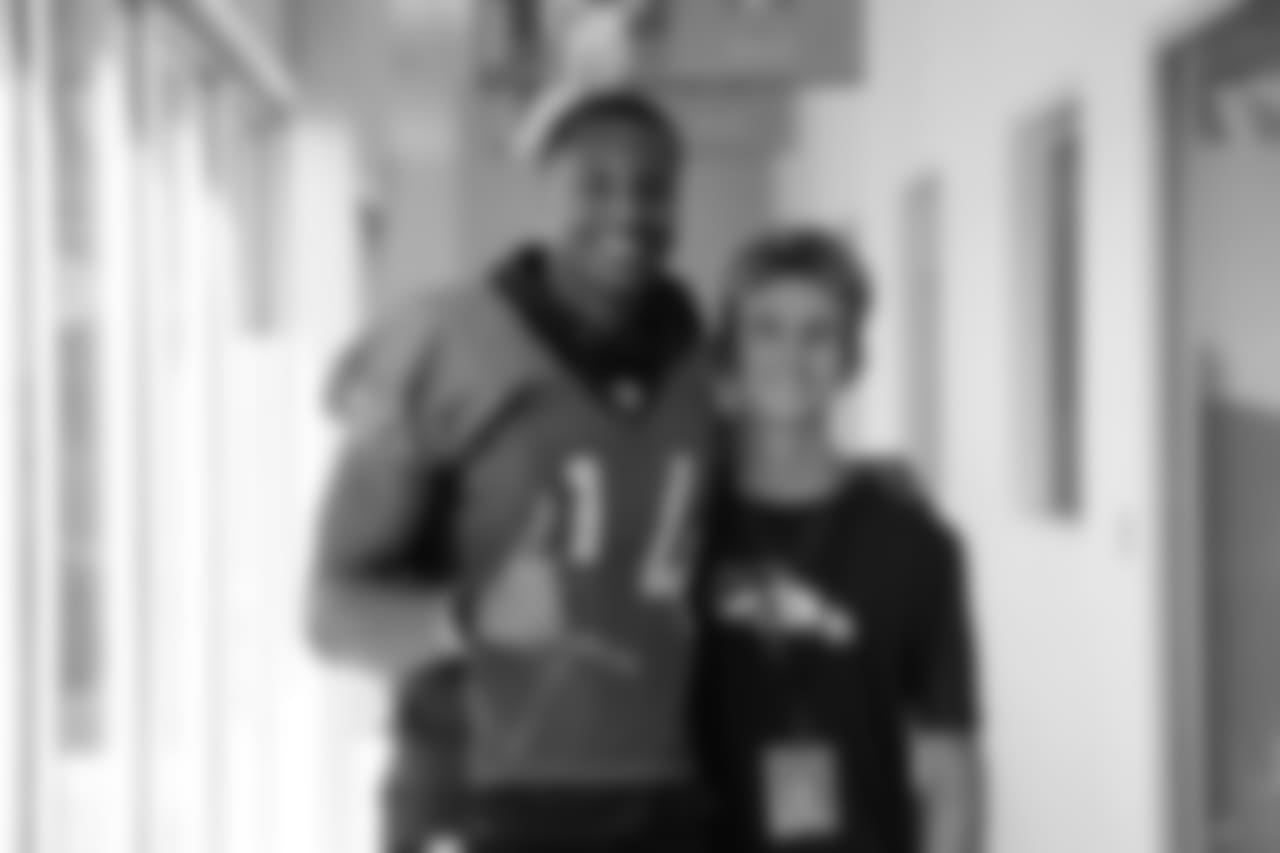 Courtland Sutton with Trey, a Children's Hospital Colorado Junior Reporter, after practice on October 31, 2018.
Photo by Gabriel Christus