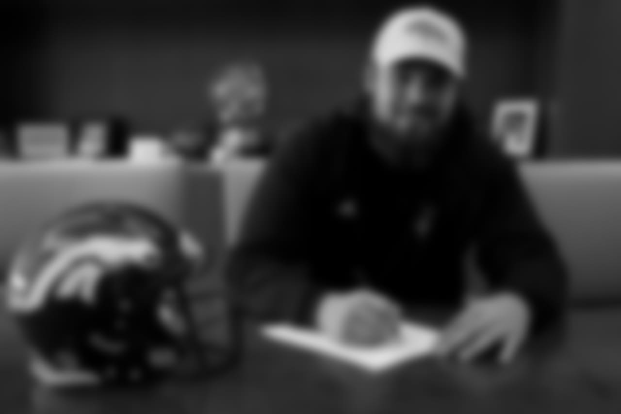G Sam Jones signs his rookie contract.