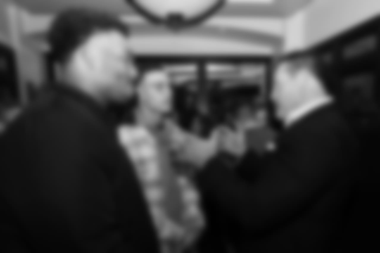 Elijah Wilkinson and Justin Simmons talk with Mark Schlereth during Shane Ray's 2nd Annual Rays Awareness Steak Dinner at 801 Chophouse in Denver on November 12, 2018.