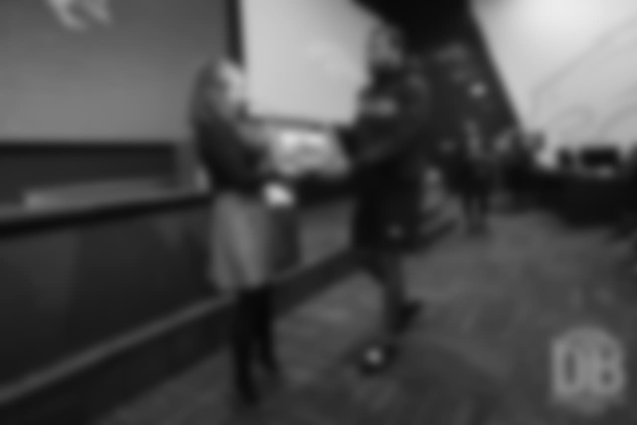 during the Broncos' 2018 community awards announcement ceremony during a team meeting on December 6, 2018.