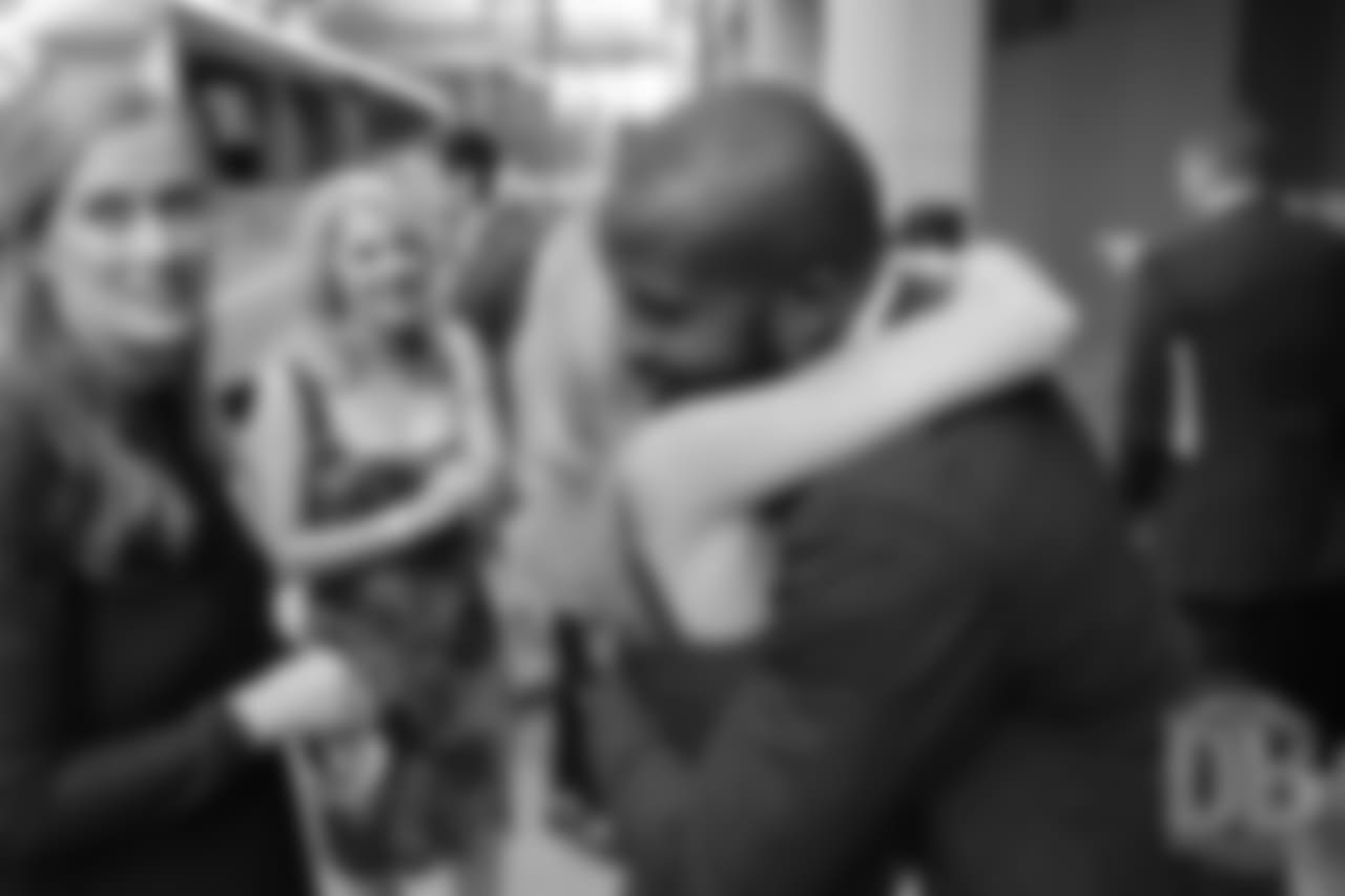 Annabel Bowlen greets Champ Bailey after the announcement of the Pro Football Hall of Fame's Class of 2019 on February 2, 2019.