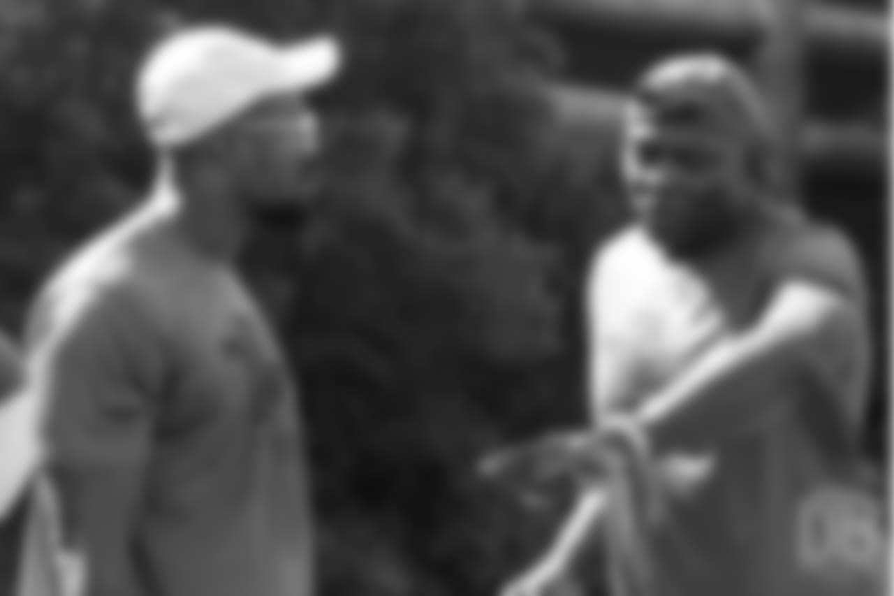 Bruce Smith gives Von Miller some instruction during the on-field portion of Von Miller's Pass Rush Summit, which included hands-on instruction and drills, on June 28, 2018.