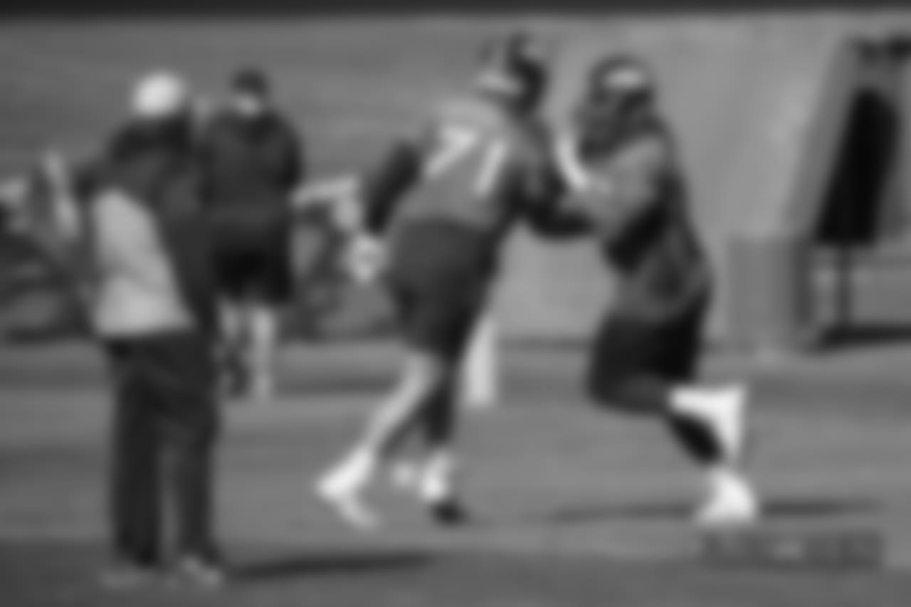 Head Coach Vance Joseph watches as Ron Leary and Austin Schlottmann take part in a drill at practice at UCHealth Training Center on October 12, 2018.