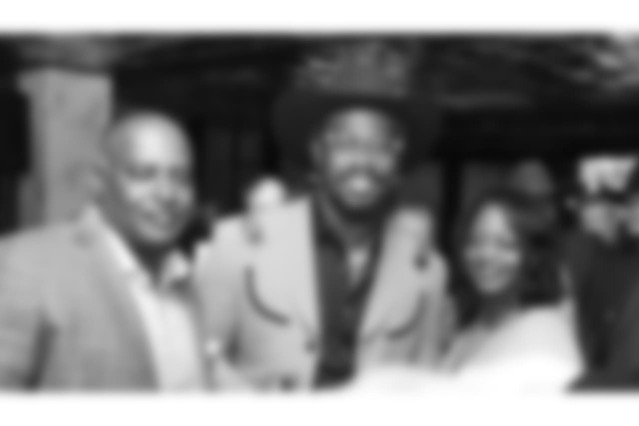 Von Miller poses with guests during Von's Vision at Mile High Station in Denver on November 5, 2018.