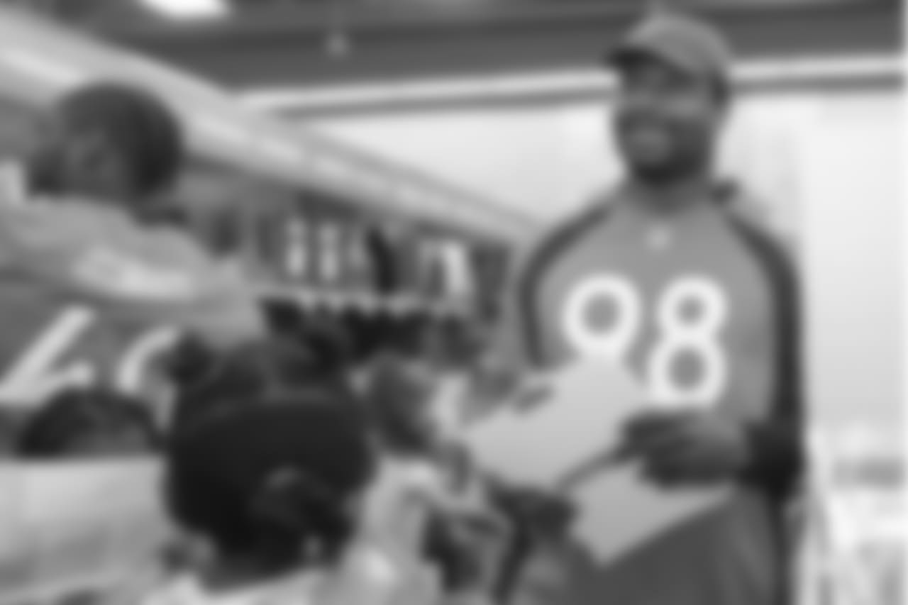 Defensive lineman Clinton McDonald (98) at the 2018 Back to School with the Broncos shopping spree on July 23, 2018. Each student received $100 for school supplies.