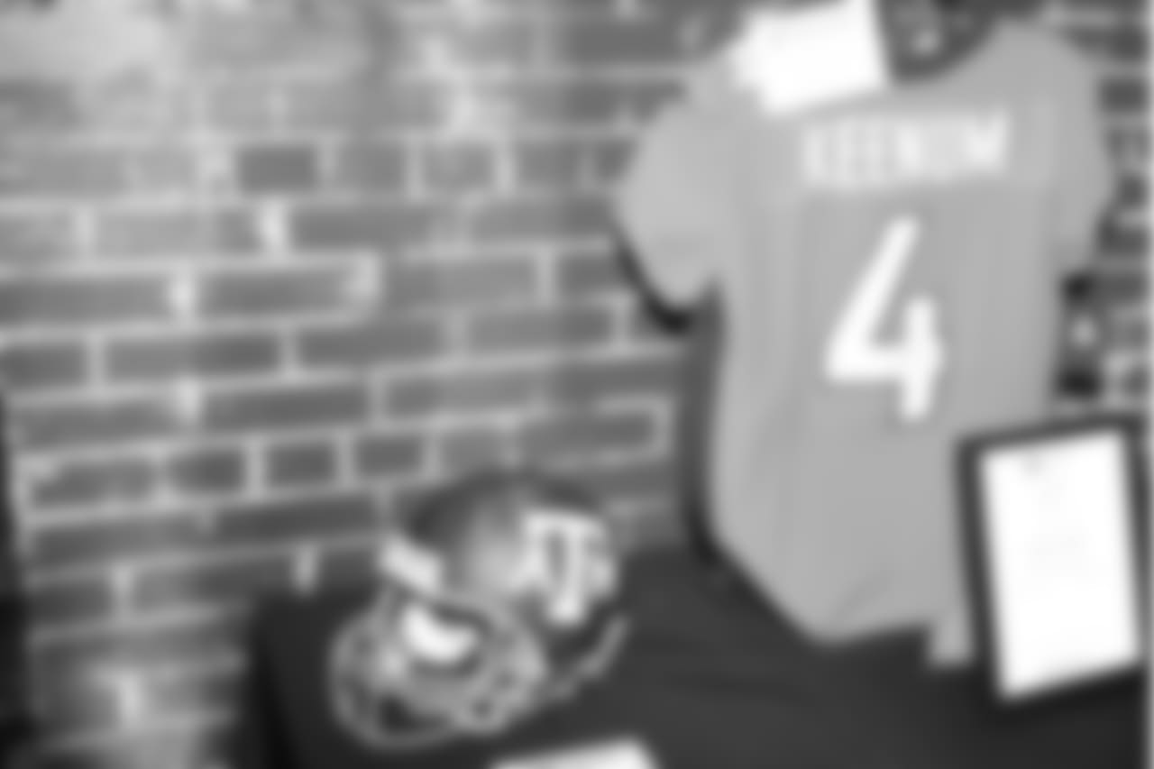 A Von Miller signed Texas A&M helmet and signed Case Keenum Broncos jersey on display for auction during Von's Vision at Mile High Station in Denver on November 5, 2018.