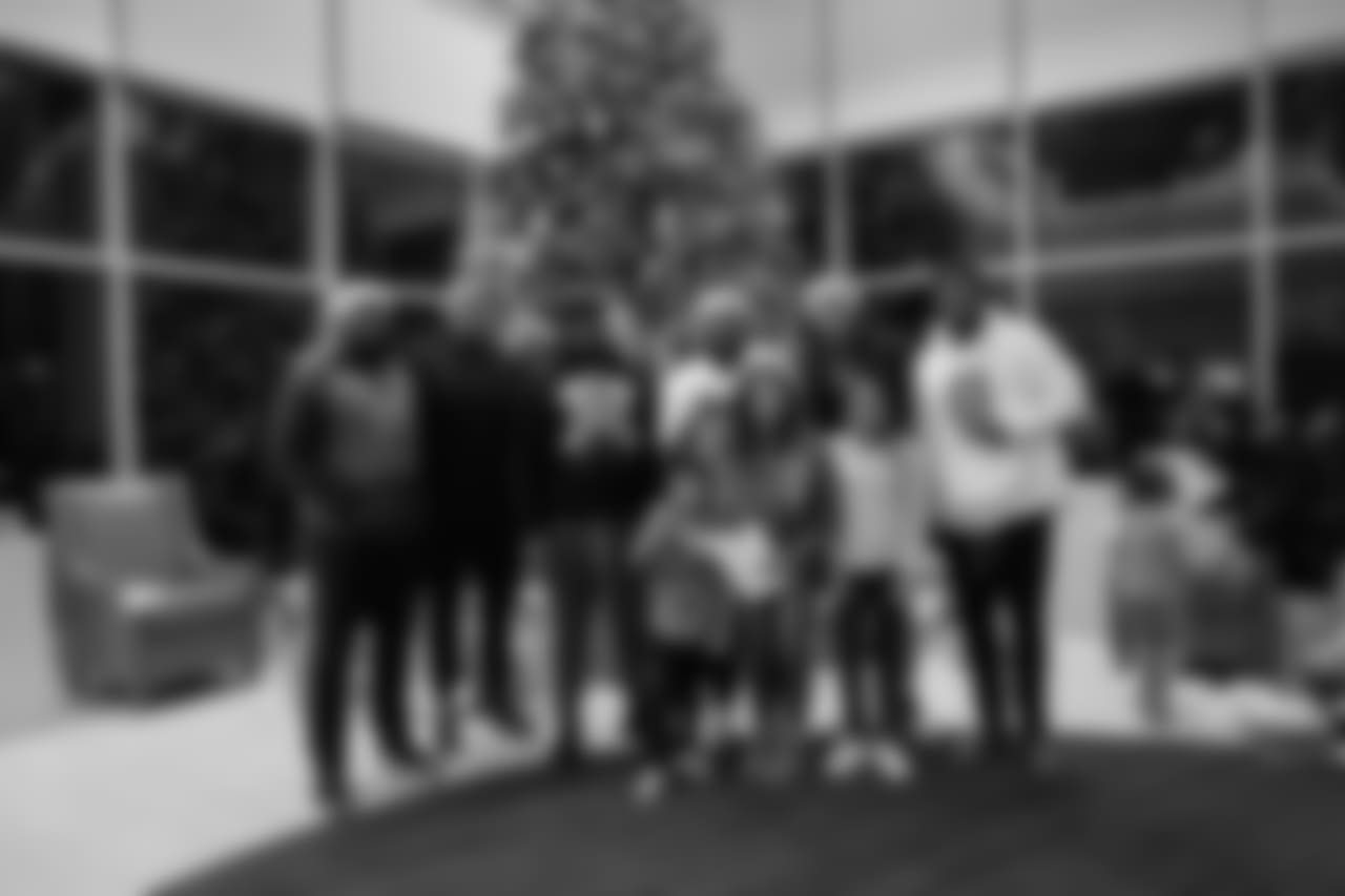 Domata Peko Sr. and his wife Anna and the rest of the defensive linemen hosted families the Pekos adopted for the holidays for a gift-giving experience at UCHealth Training Center on December 21, 2018.