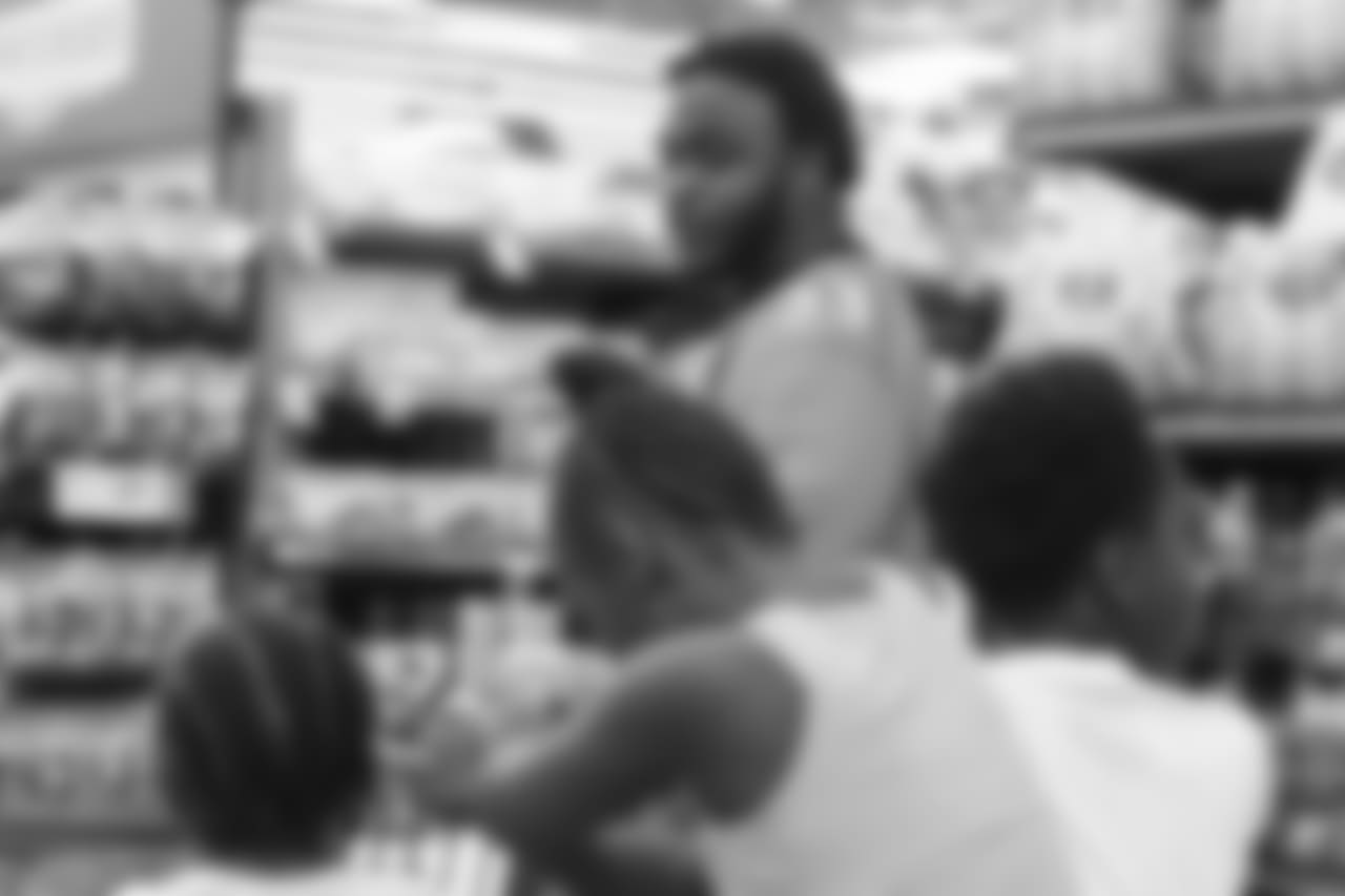 Running back De'Angelo Henderson Sr. (33) at the 2018 Back to School with the Broncos shopping spree on July 23, 2018. Each student received $100 for school supplies.