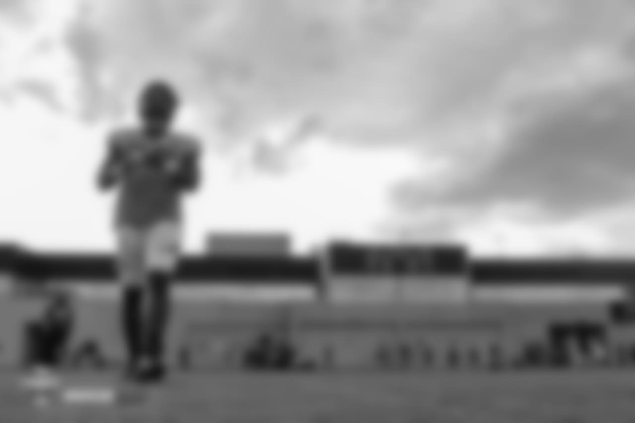Outside linebacker Bradley Chubb (55) walks onto the field before the eighth day of training camp on August 5, 2018, at UCHealth Training Center.