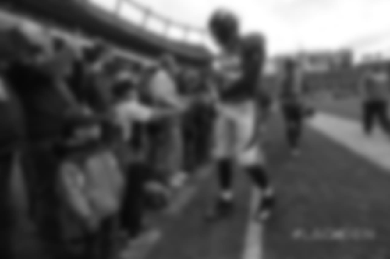 Von Miller greets young fans before the Broncos' Week 17 game against the Los Angeles Chargers at Broncos Stadium at Mile High on December 30, 2018.