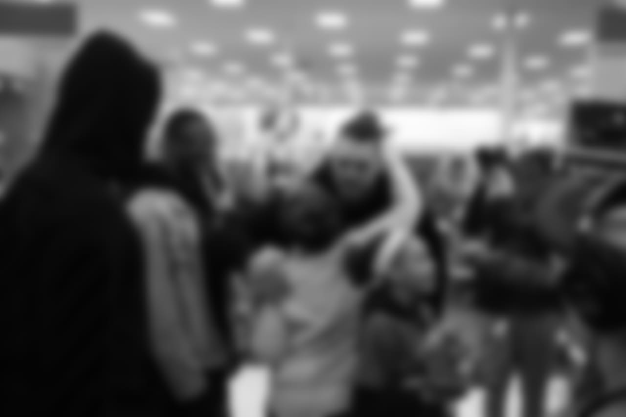 Derek Wolfe greets people during Will Parks' shopping spree for the Boys & Girls Club of Metro Denver on Dec. 3, 2018