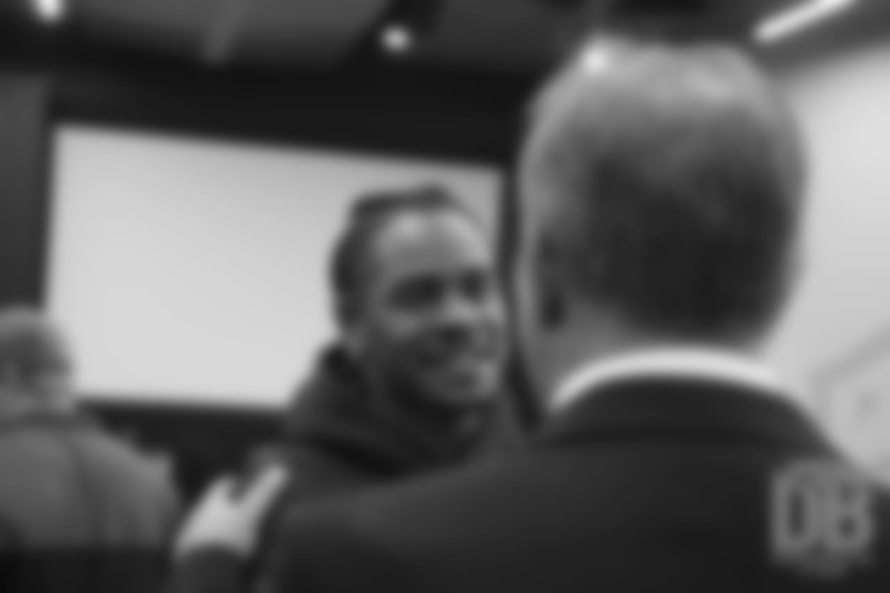 Todd Davis greets Head Coach Vic Fangio after his introductory press conference on January 10, 2019.
Photo by Gabriel Christus